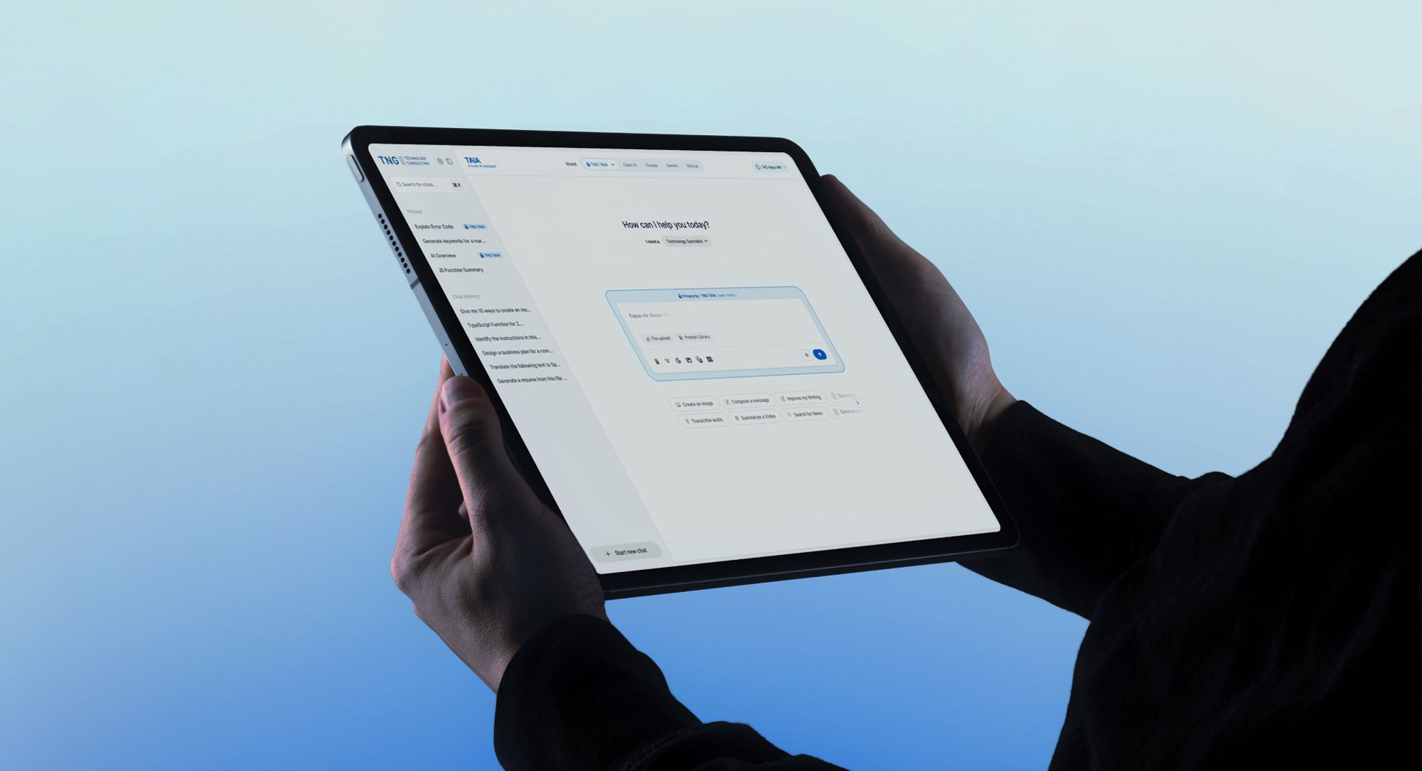 Person holding a tablet displaying an AI assistant interface for asking questions and generating responses.