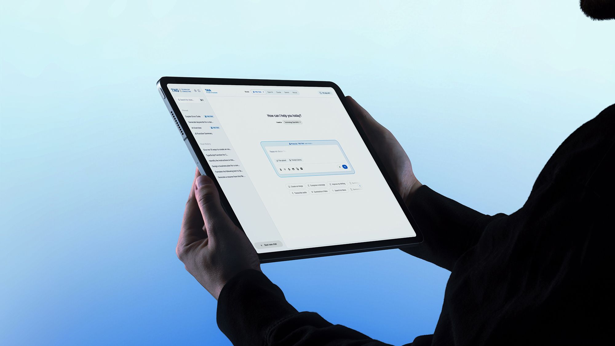 Person holding a tablet displaying an AI assistant interface for asking questions and generating responses.