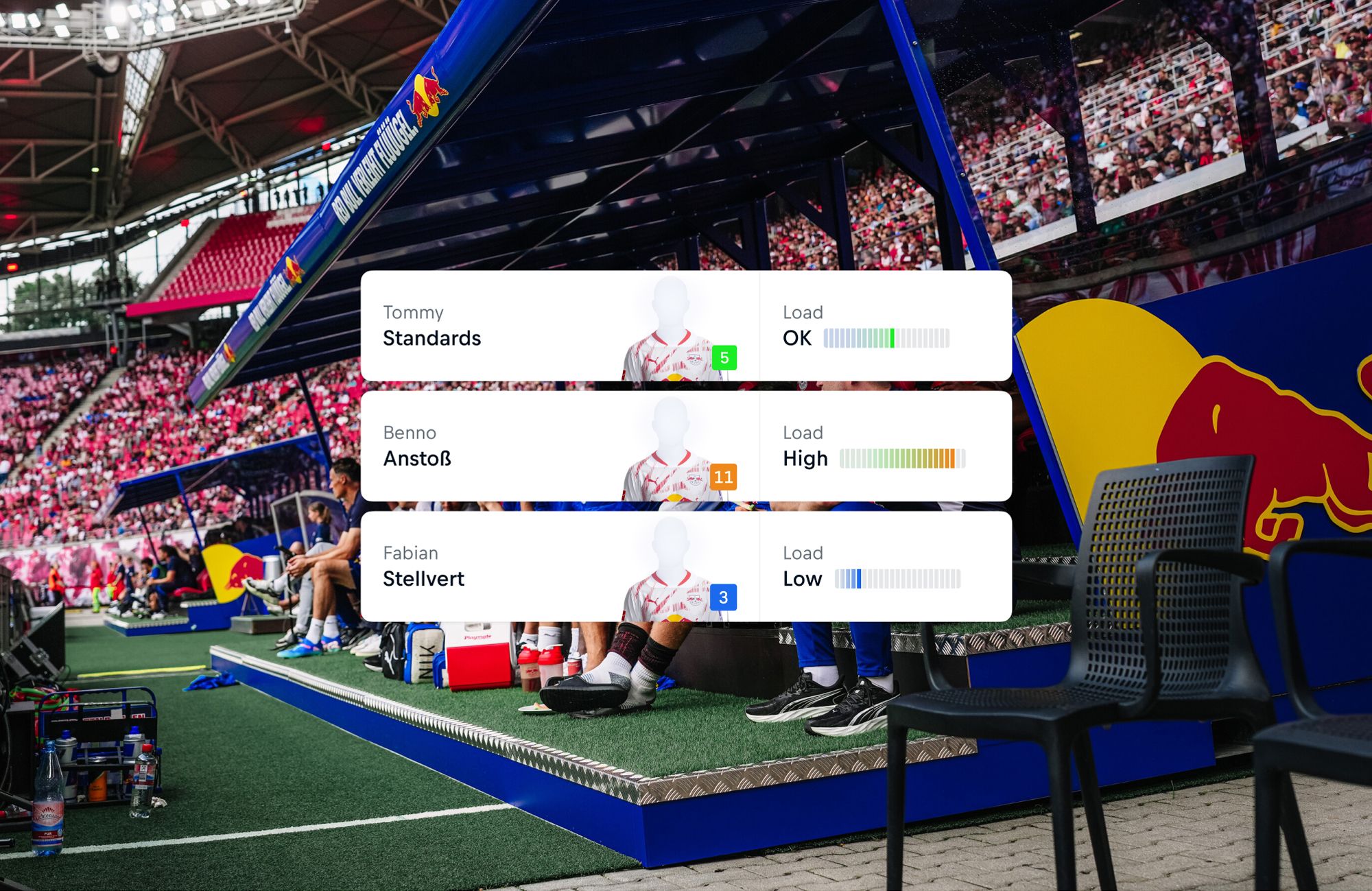 Soccer team bench in a stadium with a digital overlay showing player load and status indicators.